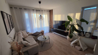 Wohnzimmer - Hochwertige 2-Zimmer-Wohnung mit Balkon und Aufzug